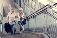 Senior couple tourists traveling city