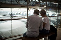 Senior couple traveling airport scene