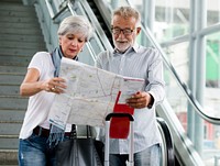 Senior couple traveling around the city