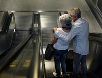 Senior couple tourists traveling city