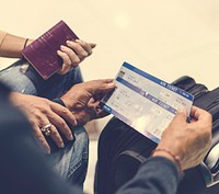 Close up up boarding passes couple traveling