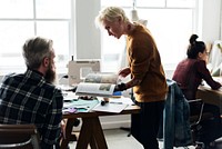 Fashion designers working in a studio