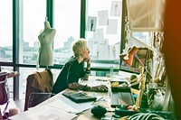 Fashion designer working on her workspace