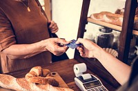 People hands credit card payment bakery