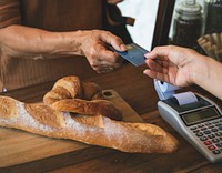 Customer buying some bread 