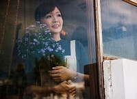 Woman holding flowers