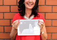 Senior lady holding a digital tablet