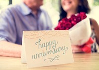 Happy Anniversary card with the couple in the background