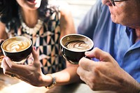 Mature couple enjoying coffee together