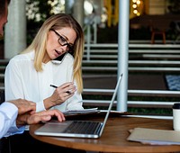 Businesswoman working with her colleague