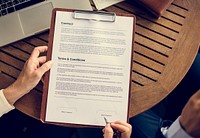 Hands Hold Contract Form Paper Clipboard Business Talk