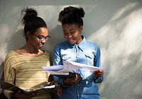 Student sharing her thoughts with her friend