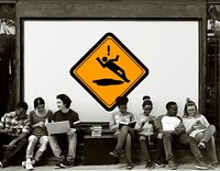 Group of Friends Sitting Together with Slip Caution Attention Banner Behind