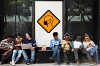 Group of Friends Sitting Together with Protection Mask Banner Behind