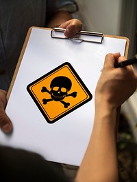 Poison Danger Sign Attention Banner on Paper