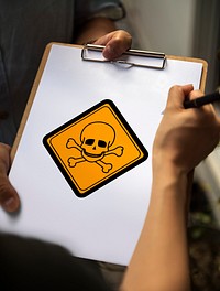 Poison Danger Sign Attention Banner on Paper
