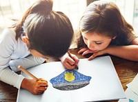 Children with a drawing of police hat