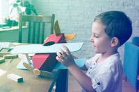 Boy Playing Plane Toy Aspiration