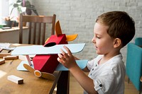 Boy Playing Plane Toy Aspiration