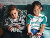 Brother Sister Playing Video Game