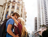 Sweet couple embracing and staring at each other