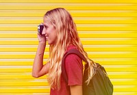 Photo Gradient Style with Woman taking a photo yellow wall background