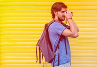 Photo Gradient Style with Man taking a photo yellow wall background