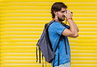 Man with a camera taking a photo