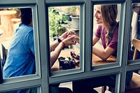 Couple date restaurant holding hands