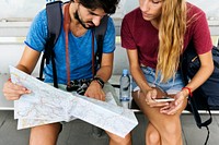 Couple traveling together with a map