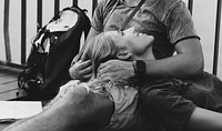 Woman lying on boyfriend's lap traveling