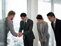 Business Partners Introductionary Handshake Bow