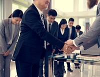 Business Partners Introductionary Handshake Bow
