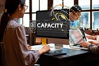 Capacity word graphic design with people working in the office