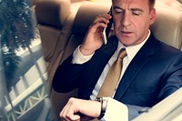 Businessman Talking Using Phone Car Inside