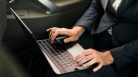 Business People Using Laptop Networking Car Inside