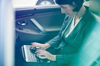 Photo Gradient Style with Businesswoman Working Using Laptop Car Inside