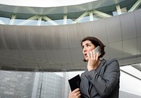Businesswoman Talking Using Phone Working Busy