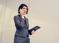 Businesswoman Talking Using Phone Working Busy