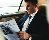 Businessman reading  the newspaper