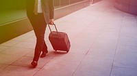 Businessman with luggage on the way to traveling