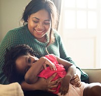 African mother and daughter having a good time together