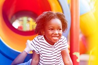 Little african girl smiling and lifted