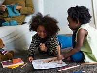 African children drawing together