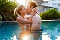 Lovely couple having a great time on a swimming pool