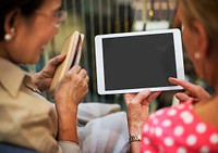 Senior Women Use Hands Hold Tablet