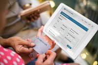 Senior Women Use Tablet Online Payment