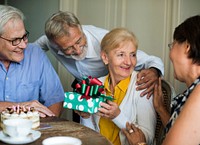 Elderly woman receive a gift