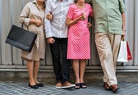 Senior adult friends shopping together