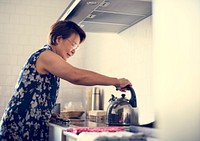 Senior Woman Cooking Food Kitchen